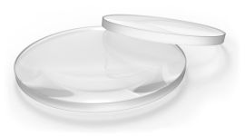Transparent glass lenses lying side by side.